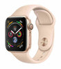 Apple Watch Series 4 in pink gold with light pink silicone band showing front screen with activity and weather data