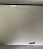 Silver Apple MacBook Air 13 inch bottom view showing screws and rubber feet, 2013 model with Intel Core i5 processor