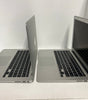 Two Apple MacBook Air A1466 13.3-inch Intel i5 laptops side by side, showing keyboard and screen in silver color