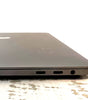 Space Gray Apple MacBook Pro 15-inch closed view showing dual Thunderbolt ports and headphone jack side profile