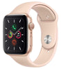 Apple Watch Series 5 40mm in pink gold with pink silicone band showing active screen and side button details