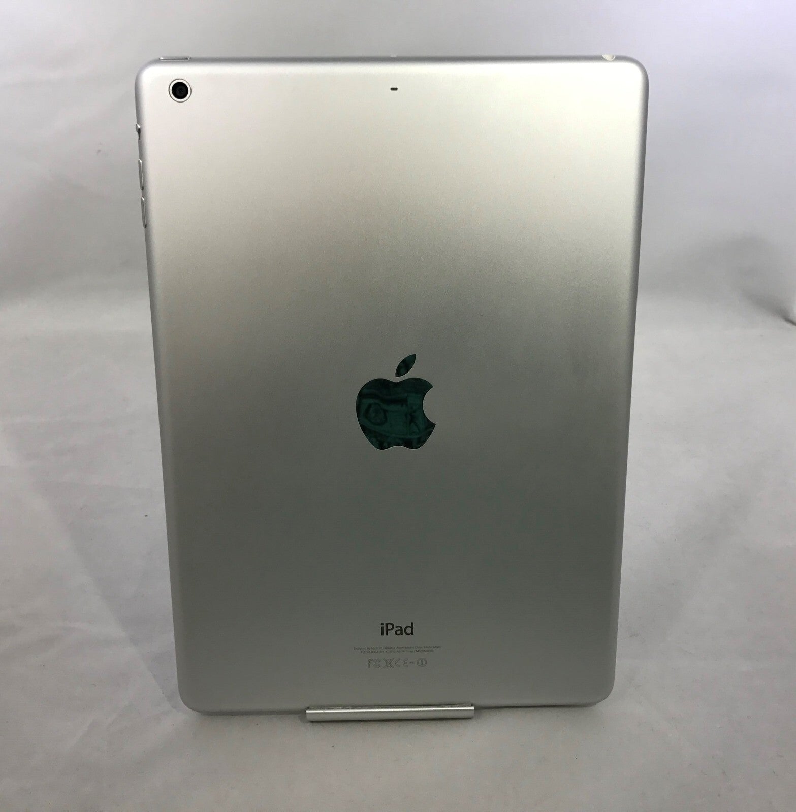 Silver Apple iPad Air 1st Generation showing back with rear camera and Apple logo in excellent condition