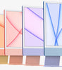 Seven colorful Apple iMac 24-inch models in green, yellow, orange, pink, purple, and blue arranged in a row on white background