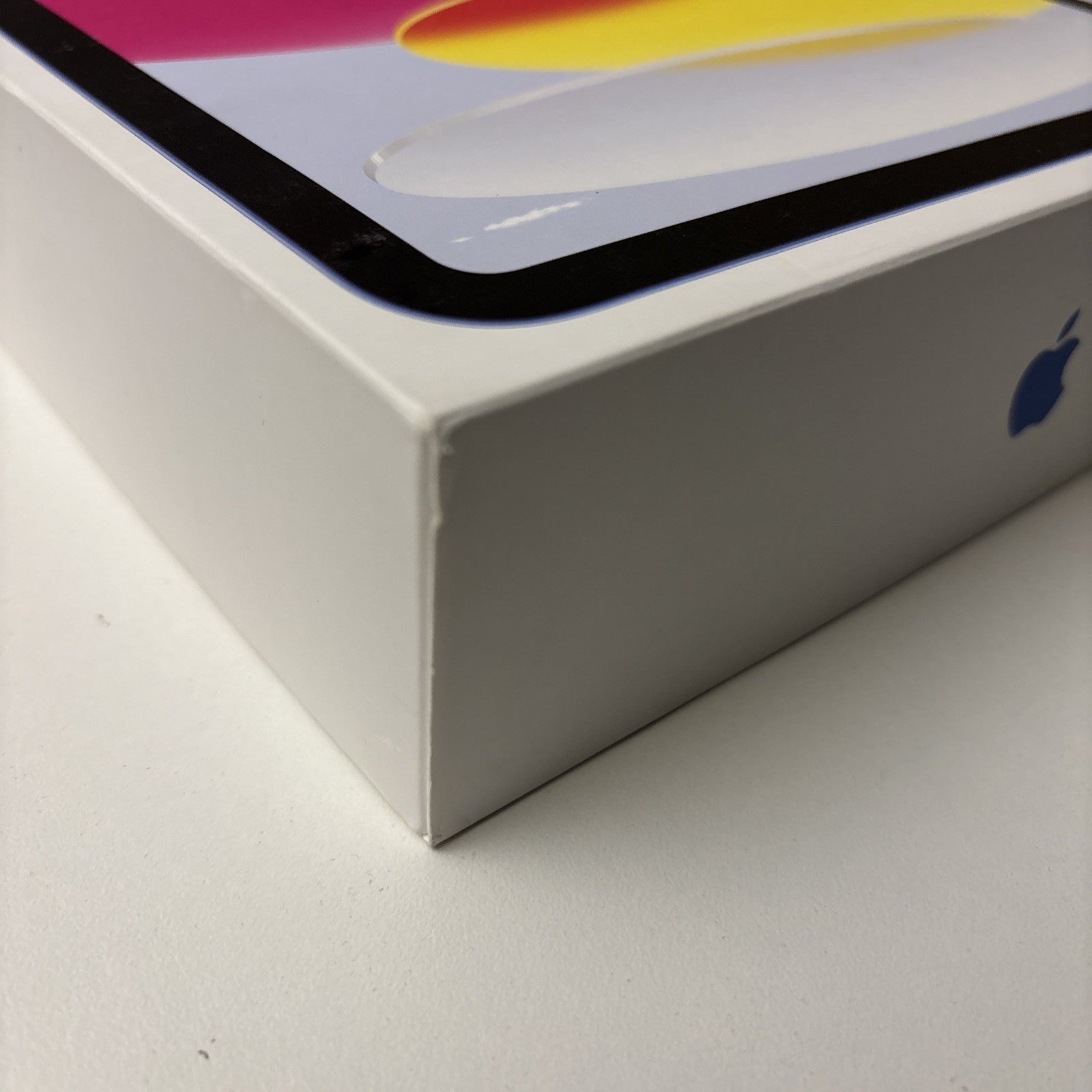White box packaging of Apple iPad 10th Gen 10.9 inch Blue model shown on plain white surface