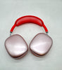 Apple AirPods Max Lightning A2096 over-ear headphones in pink with red headband and silver ear cups shown from top view
