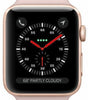 Apple Watch Series 3 38mm in rose gold with pink silicone band showing active watch face and side button