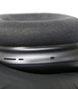 Close-up of Apple AirPods Max Space Gray wireless over-ear headset showing ear cushion and stainless steel frame detail