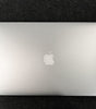 Apple MacBook Air A1466 13.3-inch laptop closed showing silver aluminum top with Apple logo centered on dark background