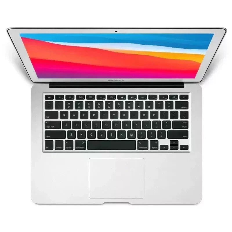 Apple MacBook Air 13 inch laptop open top view showing keyboard and colorful screen with macOS Monterey installed