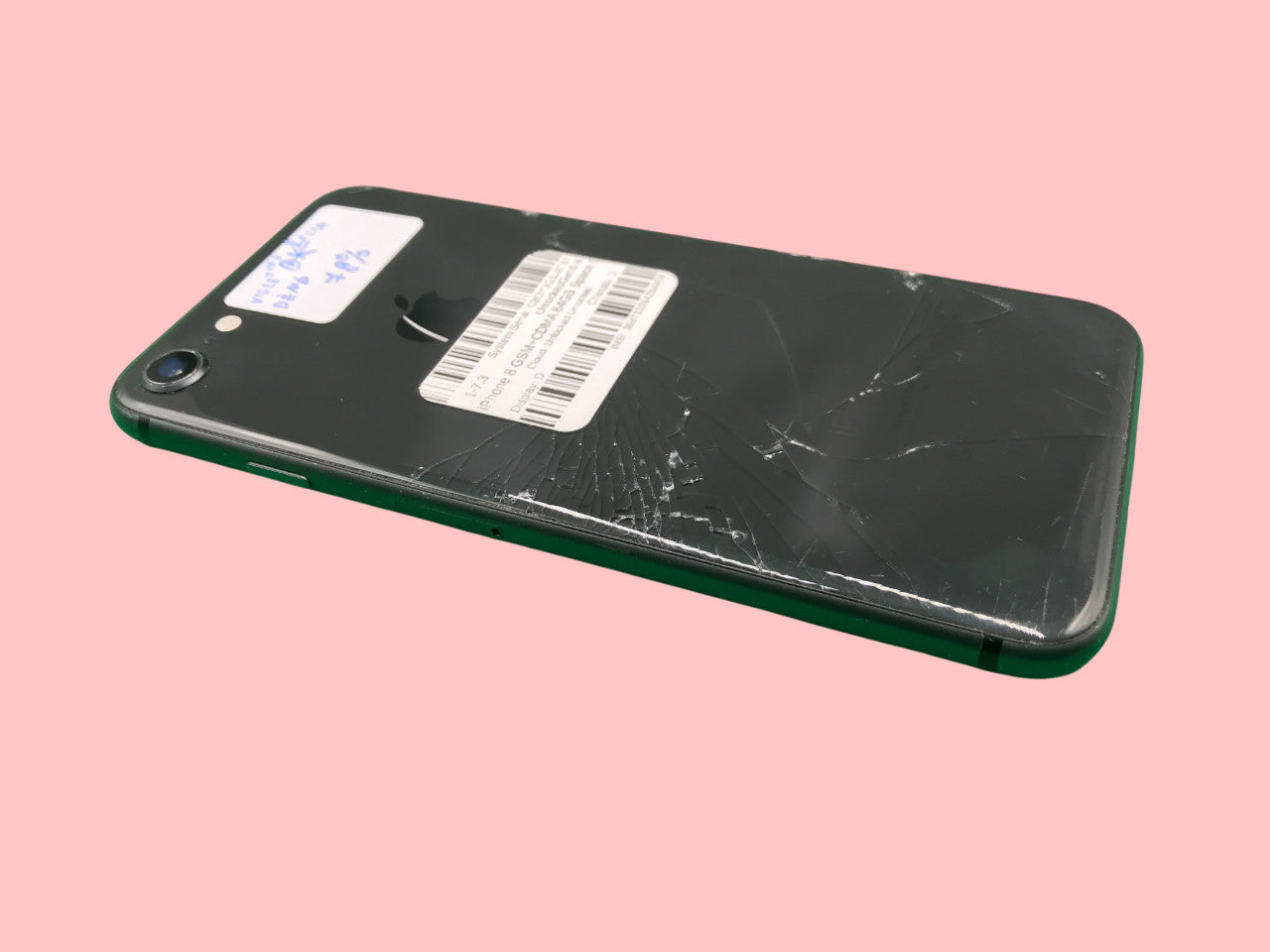 Apple iPhone 8 A1905 Space Gray with cracked back glass, 64GB storage, unlocked, 78% battery, shown on pink background