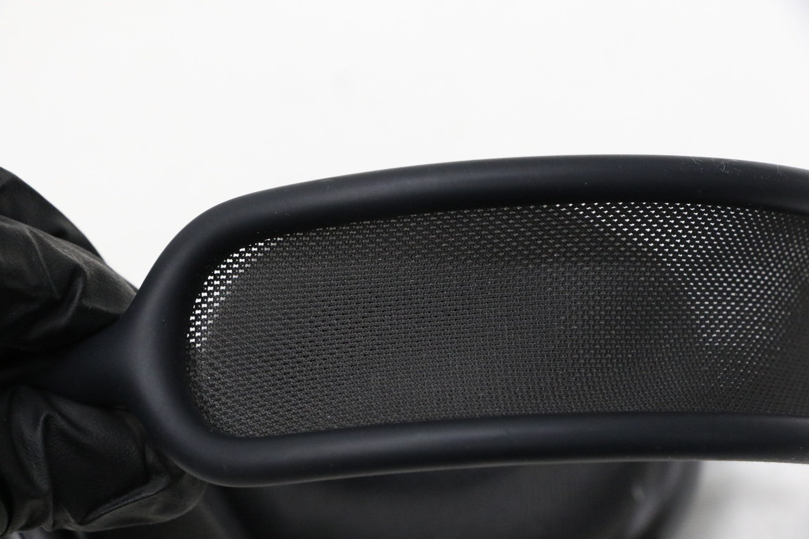 Apple AirPods Max Space Gray wireless over-ear headset showing breathable mesh headband close-up view