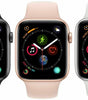 Apple Watch Series 4 in black, pink gold, and silver with activity and health app displays on 40mm and 44mm cases