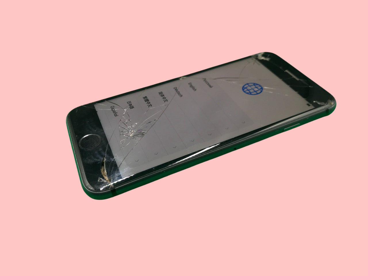 Apple iPhone 8 A1905 Space Gray with broken glass screen showing setup menu on pink background