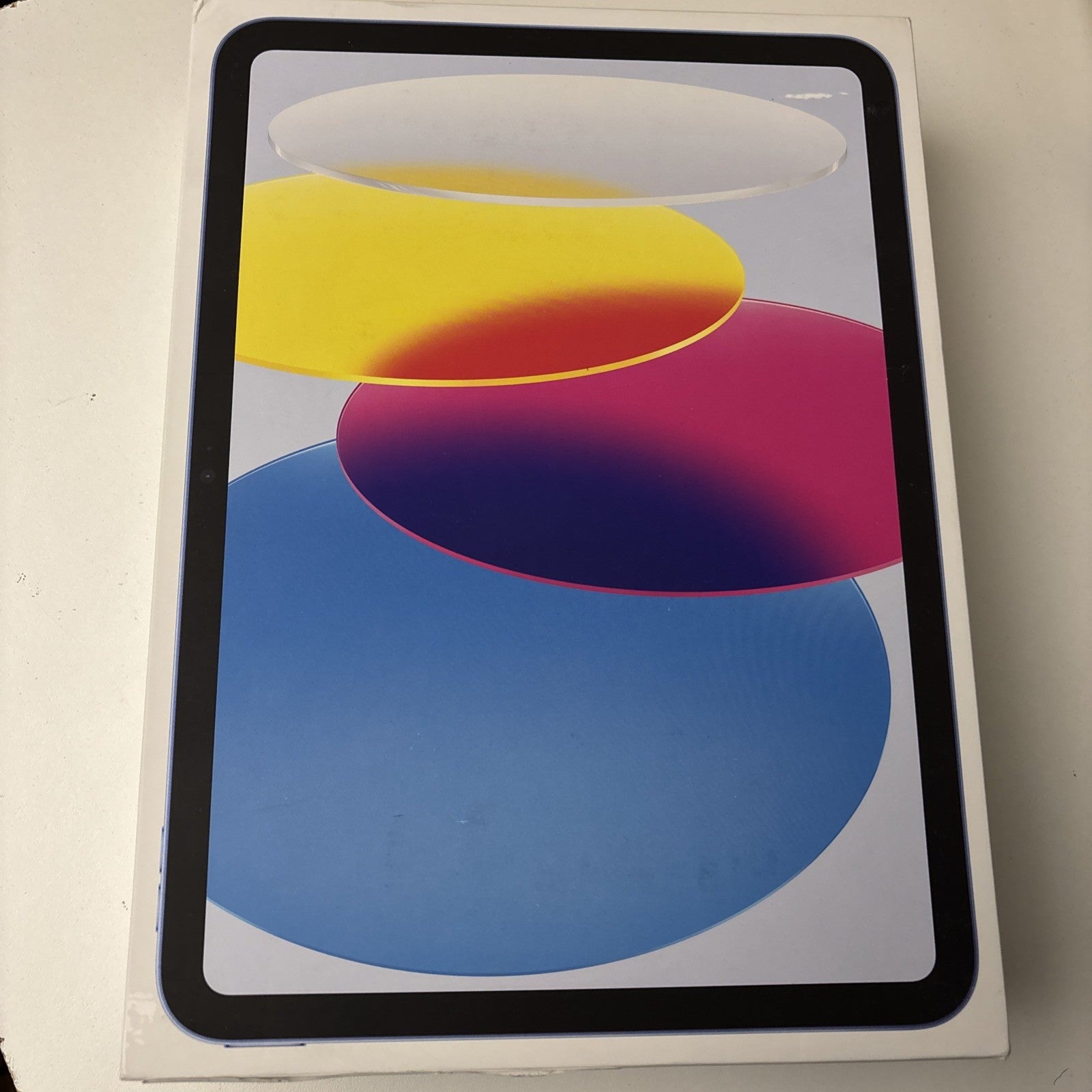 Apple iPad 10th Gen 10.9 inch 64GB Wi-Fi Blue box showing front screen with colorful abstract wallpaper excellent condition